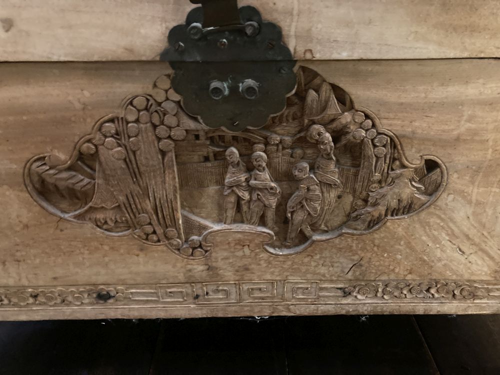 A Chinese carved camphorwood trunk, width 92cm depth 48cm height 51cm
